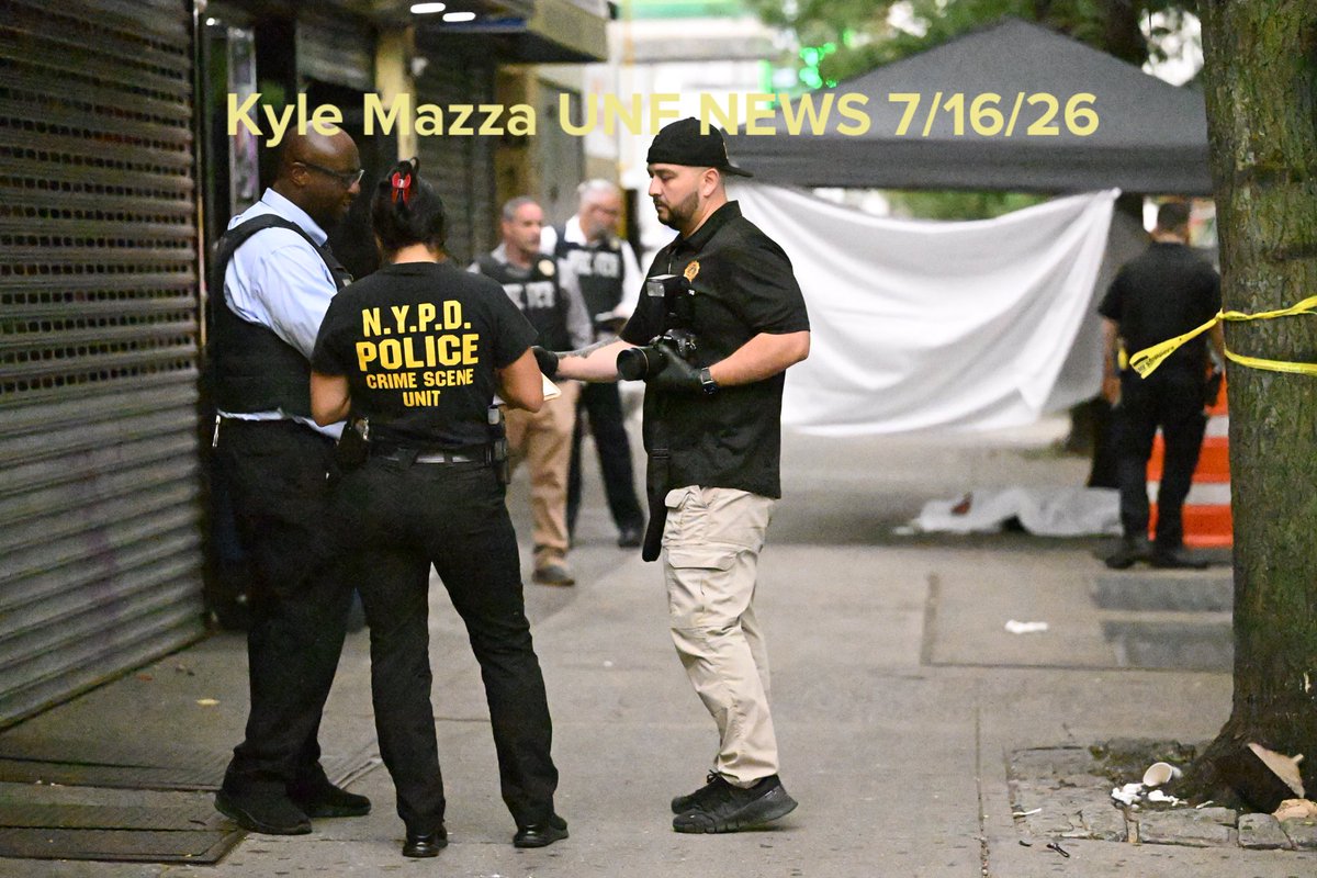 Members of the NYPD Crime Scene Unit work the scene where a 29-year-old man was fatally shot to the head outside of a restaurant and lounge at 2362 Jerome Avenue within the confines of the 46 precinct in Bronx, New York, United States  