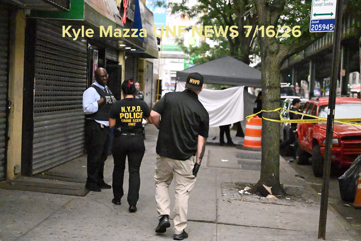 Members of the NYPD Crime Scene Unit work the scene where a 29-year-old man was fatally shot to the head outside of a restaurant and lounge at 2362 Jerome Avenue within the confines of the 46 precinct in Bronx, New York, United States  