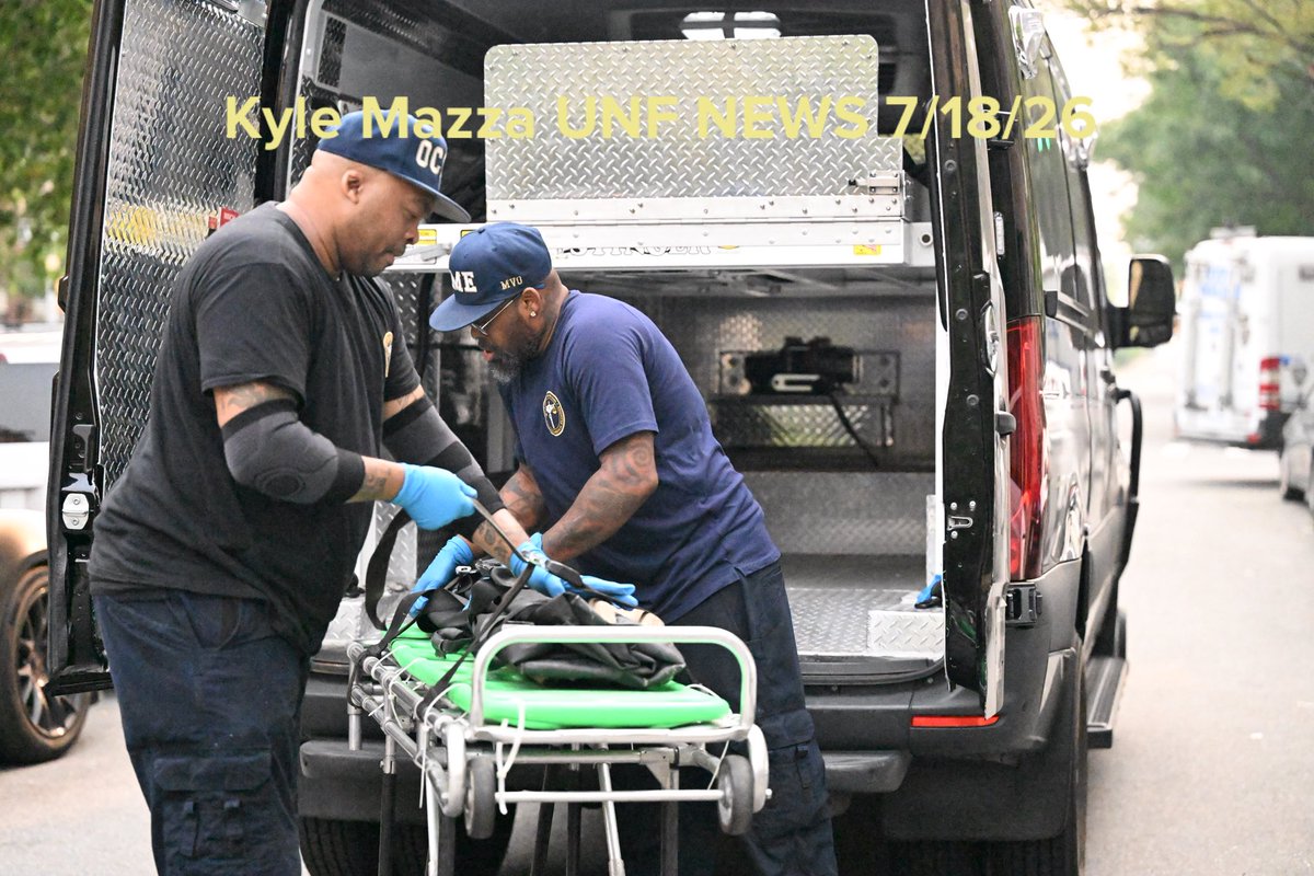 NYC Office of the Chief Medical Examiner personnel removed the body of a 24-year-old man who was found fatally shot to the eye inside of an apartment building in the area of Macombs Place and Frederick Douglass Boulevard within the confines of the 32 precinct in Manhattan 