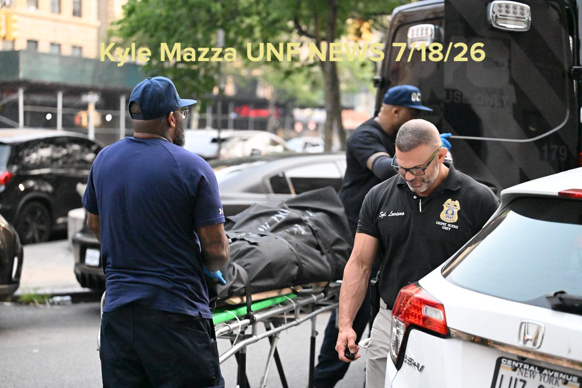 NYC Office of the Chief Medical Examiner personnel removed the body of a 24-year-old man who was found fatally shot to the eye inside of an apartment building in the area of Macombs Place and Frederick Douglass Boulevard within the confines of the 32 precinct in Manhattan 