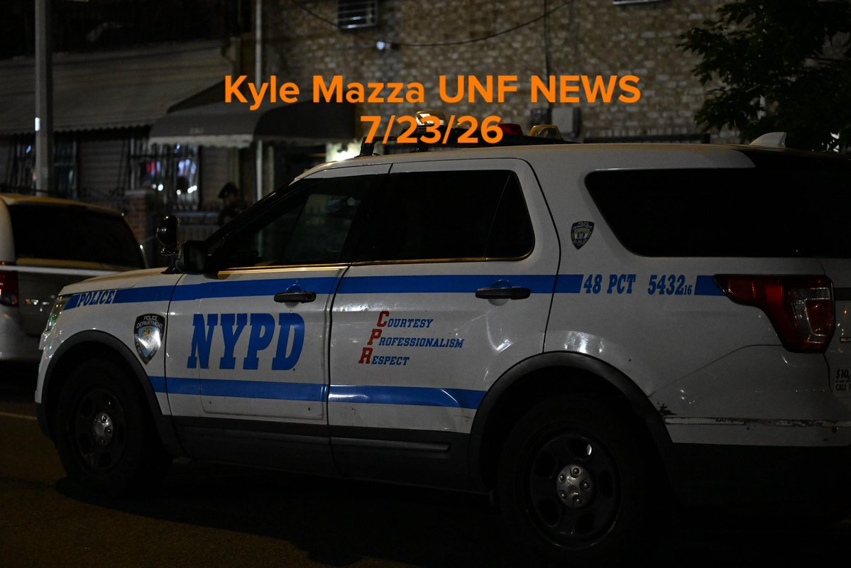 NYPD officers work the scene where a woman was injured after being shot to the abdomen at 2309 Crotona Avenue within the confines of the 48 precinct in Bronx, New York, United States on Thursday, July 23, 2026. Thursday evening at approximately 10:34pm police responded and found a woman shot to the abdomen and she was transported to St. Barnabas hospital and originally listed in stable condition. There are no arrests and the investigation is ongoing