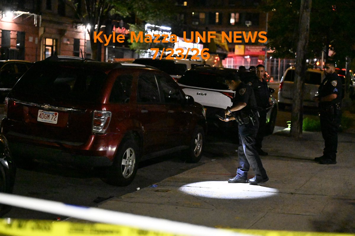 NYPD officers work the scene where a woman was injured after being shot to the abdomen at 2309 Crotona Avenue within the confines of the 48 precinct in Bronx, New York, United States on Thursday, July 23, 2026. Thursday evening at approximately 10:34pm police responded and found a woman shot to the abdomen and she was transported to St. Barnabas hospital and originally listed in stable condition. There are no arrests and the investigation is ongoing