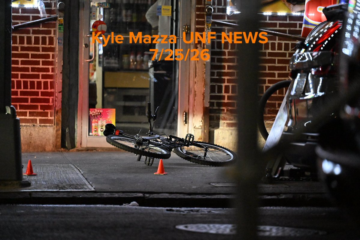 NYPD officers work the scene where a 12-year-old boy was killed and two men were injured in a shooting outside of a Supermarket and Deli at 104 Elliot Place in Bronx, New York, United States on July 25, 2026. Saturday afternoon at approximately 4:55 pm the shooting took place. A 12-year-old boy was shot to the shoulder and taken to Lincoln Hospital where he was pronounced dead.