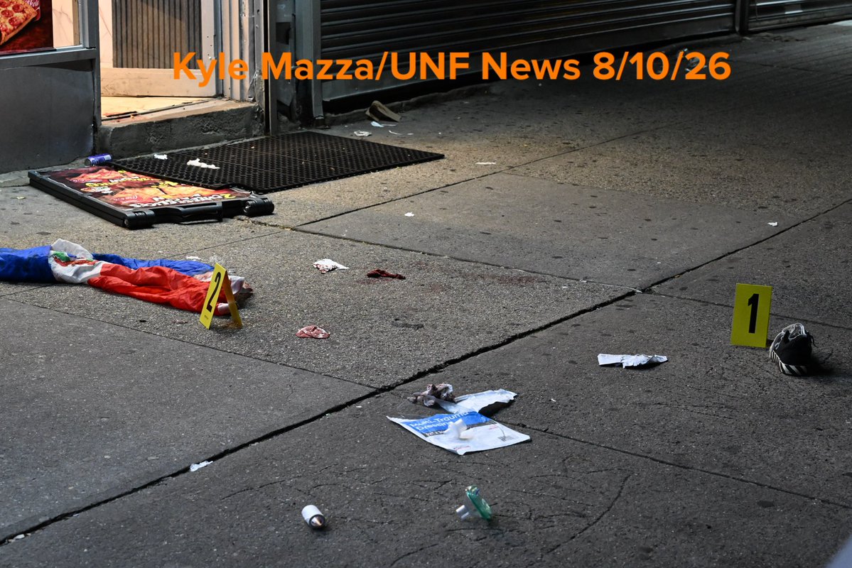 NYPD officers work the scene where a 23-year-old man was fatally stabbed to the stomach and a 23-year-old man was injured after being stabbed to the chest on Nagle Avenue in Manhattan, New York, United States on August 10, 2026. The stabbing transpired at 12:42 am Monday morning, the 23-year-old man who was stabbed to the chest was transported to New York Presbyterian Hospital in stable condition and the 23-year-old man who was stabbed to the stomach was transported to Harlem Hospital where he was pronounced dead. 