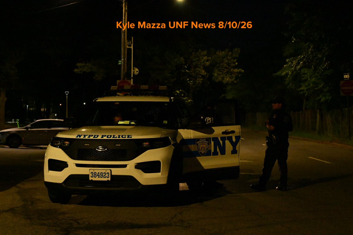 NYPD officers work the scene where a woman was shot at 507 Hollywood Avenue within the confines of the 45 precinct in Bronx, New York, United States on August 10, 2026. NYPD police officers responded at approximately 10:09 pm Monday