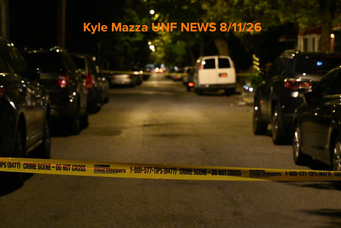 NYPD officers work the scene where a 17-year-old boy was shot to the head near 849 E 228 Street within the confines of the 47 precinct in Bronx, New York, United States 