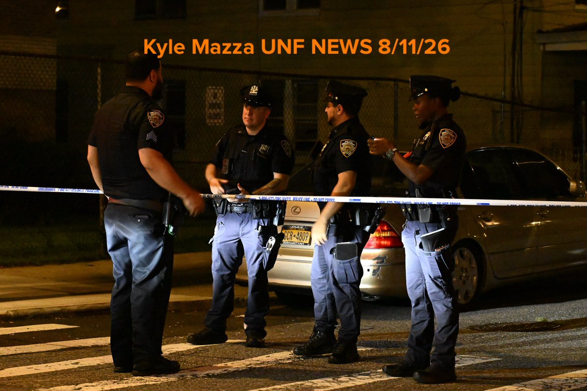NYPD officers work the scene where a 17-year-old boy was shot to the head near 849 E 228 Street within the confines of the 47 precinct in Bronx, New York, United States 