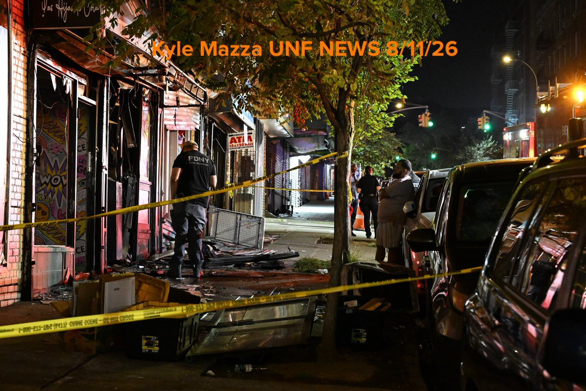 Members of the NYPD and FDNY work the scene of a fire that damaged several businesses in the area of West 183 Street within the confines of the 52 precinct in Bronx, New York, United States on August 11, 2026. Tuesday evening at approximately 10:11 pm the incident took place. A man in his 30s suffered severe burns to the face and body. Investigators are working to determine the cause of the fire.
