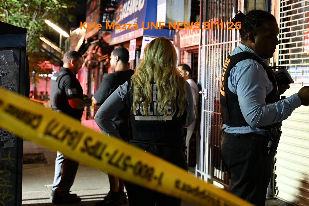 Members of the NYPD and FDNY work the scene of a fire that damaged several businesses in the area of West 183 Street within the confines of the 52 precinct in Bronx, New York, United States on August 11, 2026. Tuesday evening at approximately 10:11 pm the incident took place. A man in his 30s suffered severe burns to the face and body. Investigators are working to determine the cause of the fire.