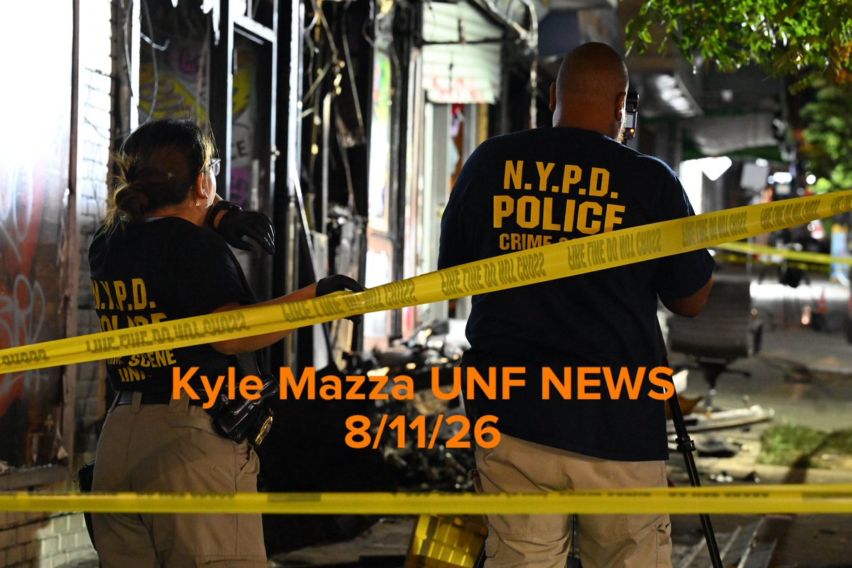 Members of the NYPD Crime Scene Unit work the scene of a fire that damaged several businesses in the area of West 183 Street within the confines of the 52 precinct in Bronx, New York 