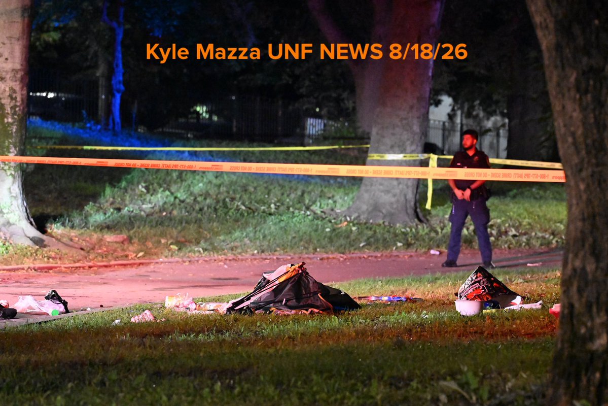 NYPD officers work the scene where a 30-year-old woman was stabbed multiple times to the body inside of Lincoln Terrace/Arthur S. Somers Park within the confines of the 77 precinct in Brooklyn