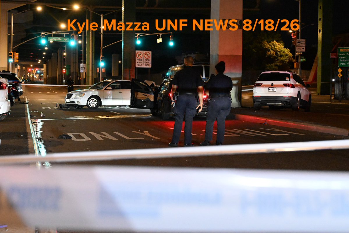 NYPD officers work the scene of a vehicle collision which caused a 51-year-old man who was riding a bike to be critically wounded and a 38-year-old woman to sustain injuries at Longwood Avenue and Bruckner Boulevard within the confines of the 41 precinct in Bronx, New York,