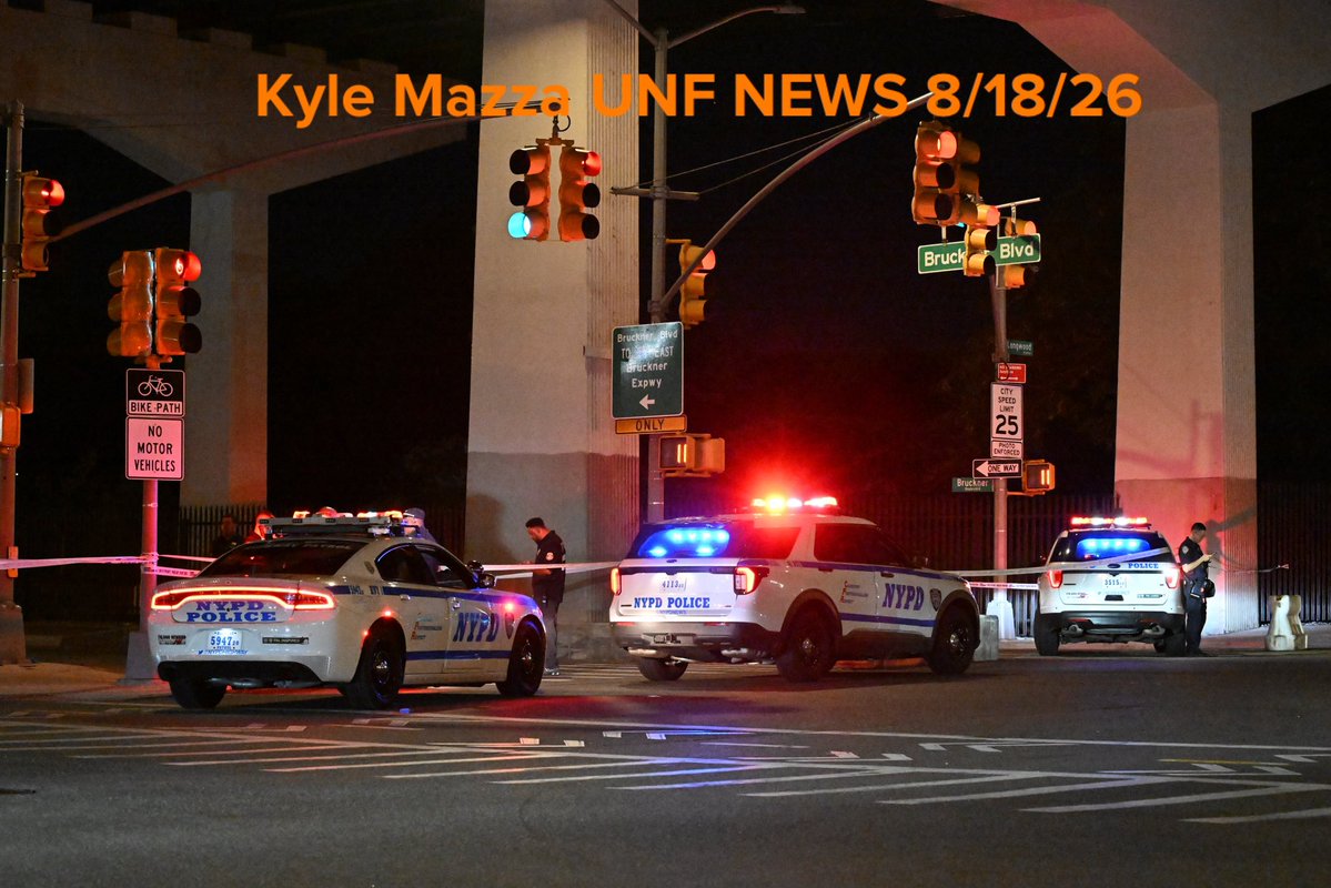 NYPD officers work the scene of a vehicle collision which caused a 51-year-old man who was riding a bike to be critically wounded and a 38-year-old woman to sustain injuries at Longwood Avenue and Bruckner Boulevard within the confines of the 41 precinct in Bronx, New York,