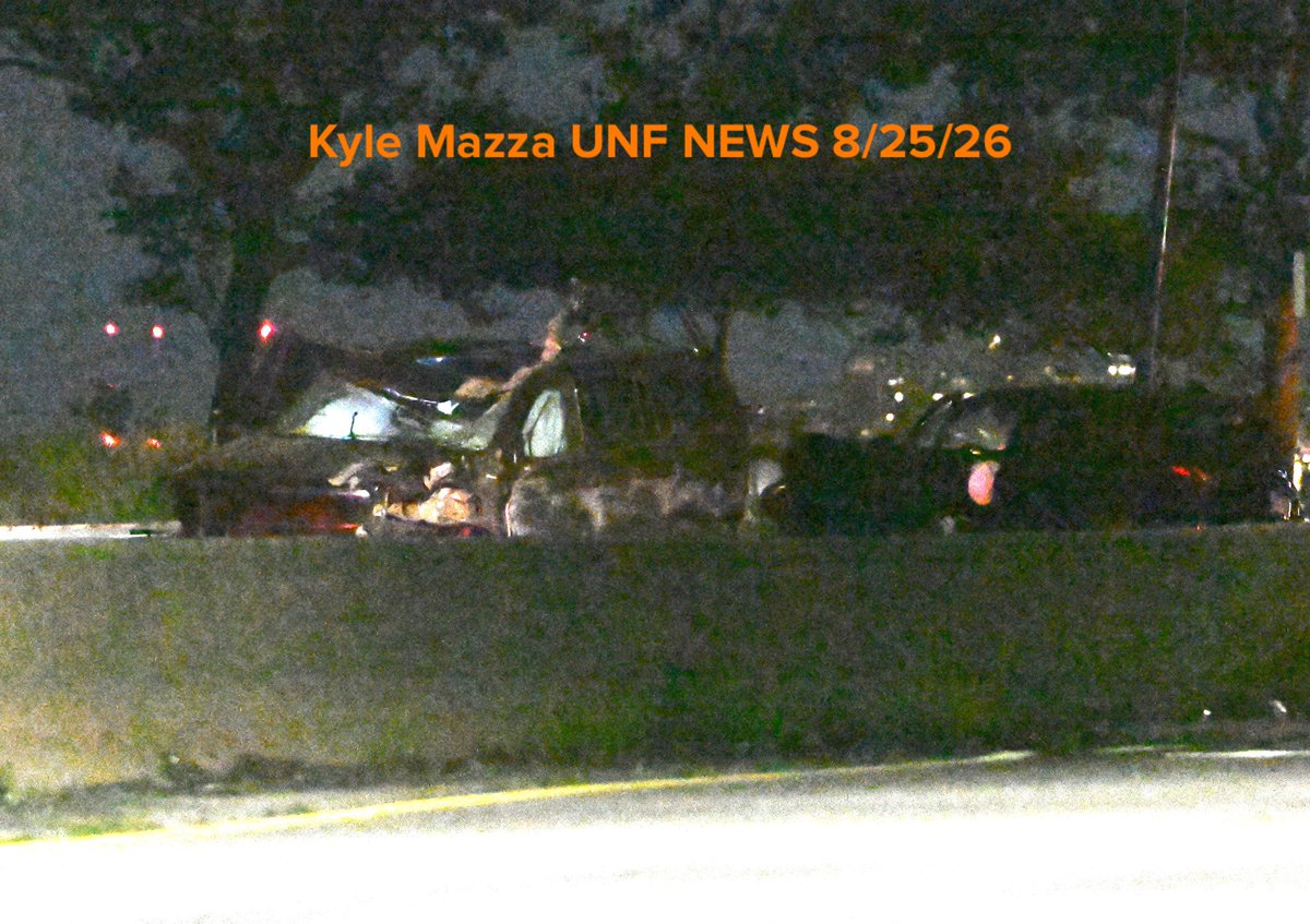 NYPD works the scene where two men were killed, two other men were critically injured and two women were injured in a vehicle crash on Belt Parkway and 65th Street at Exit 1 Eastbound within the confines of the 68 precinct in Brooklyn, New York