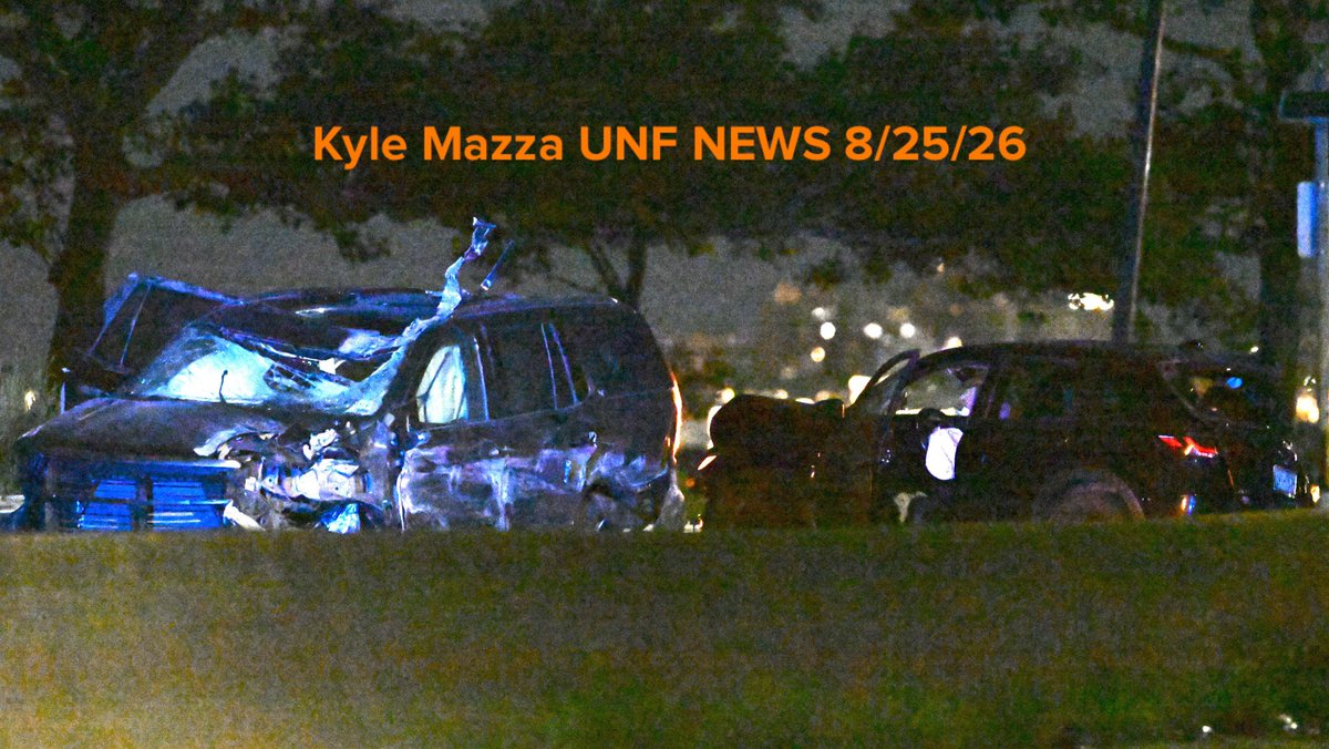 NYPD works the scene where two men were killed, two other men were critically injured and two women were injured in a vehicle crash on Belt Parkway and 65th Street at Exit 1 Eastbound within the confines of the 68 precinct in Brooklyn, New York