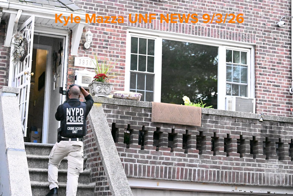NYPD crime scene unit investigators processed the scene at 3930 Bailey Avenue within the confines of the 50 precinct where a 33-year-old police officer accidentally shot himself in the leg in Bronx, New York