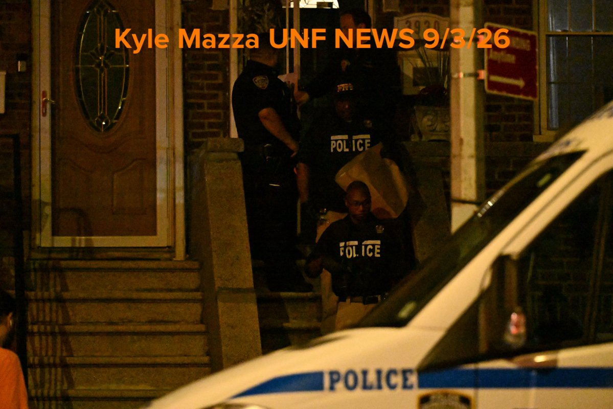 NYPD crime scene unit investigators processed the scene at 3930 Bailey Avenue within the confines of the 50 precinct where a 33-year-old police officer accidentally shot himself in the leg in Bronx, New York