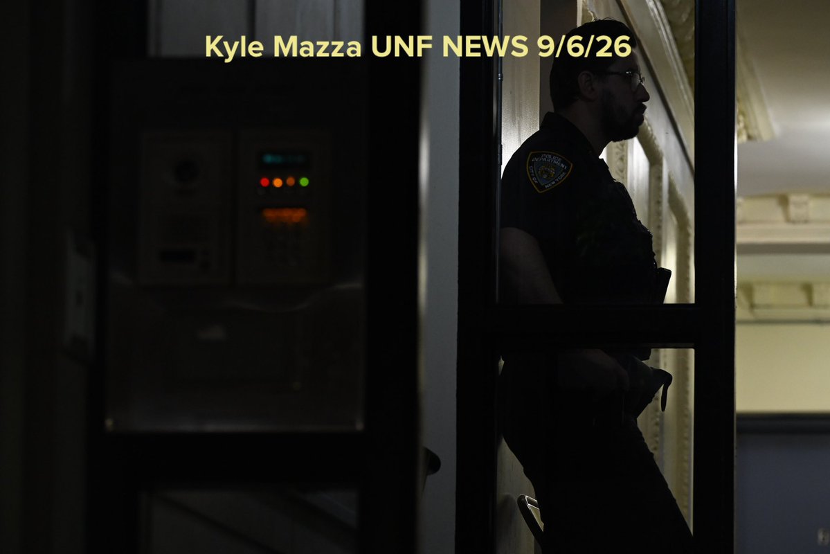 NYPD officers work the scene where a 27-year-old woman was murdered inside of 535 West 156 Street within the confines of the 33 precinct in Manhattan, New York, United States 