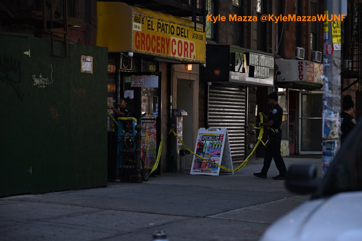 NYPD officers work the scene where a 31-year-old man was shot at 460 East 138 Street near a deli in Bronx, New York, United States on Monday, September 14, 2026. Monday afternoon the shooting transpired, the victim was transported to the hospital and at this time there are no arrests.