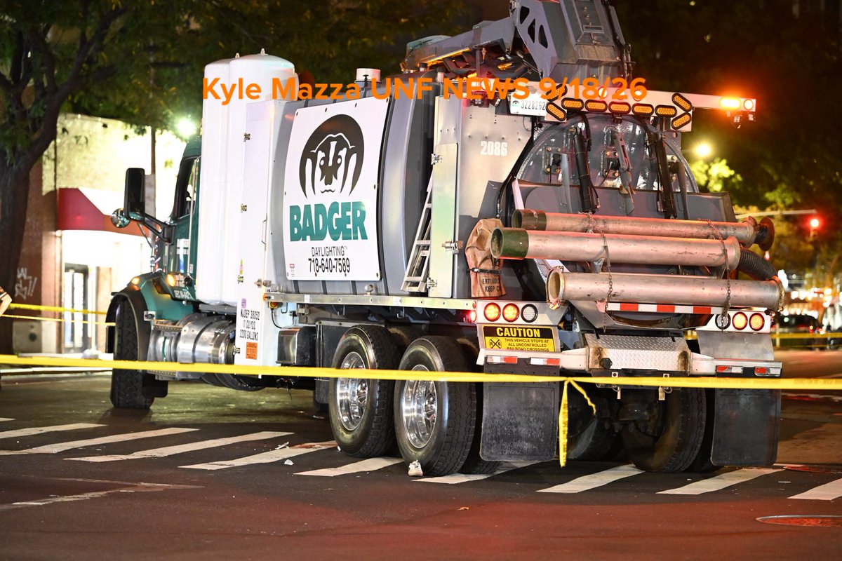 NYPD officers work the scene where two people were struck by a truck in the area of East 14th Street and 1st Avenue in Manhattan, New York, United States on Friday